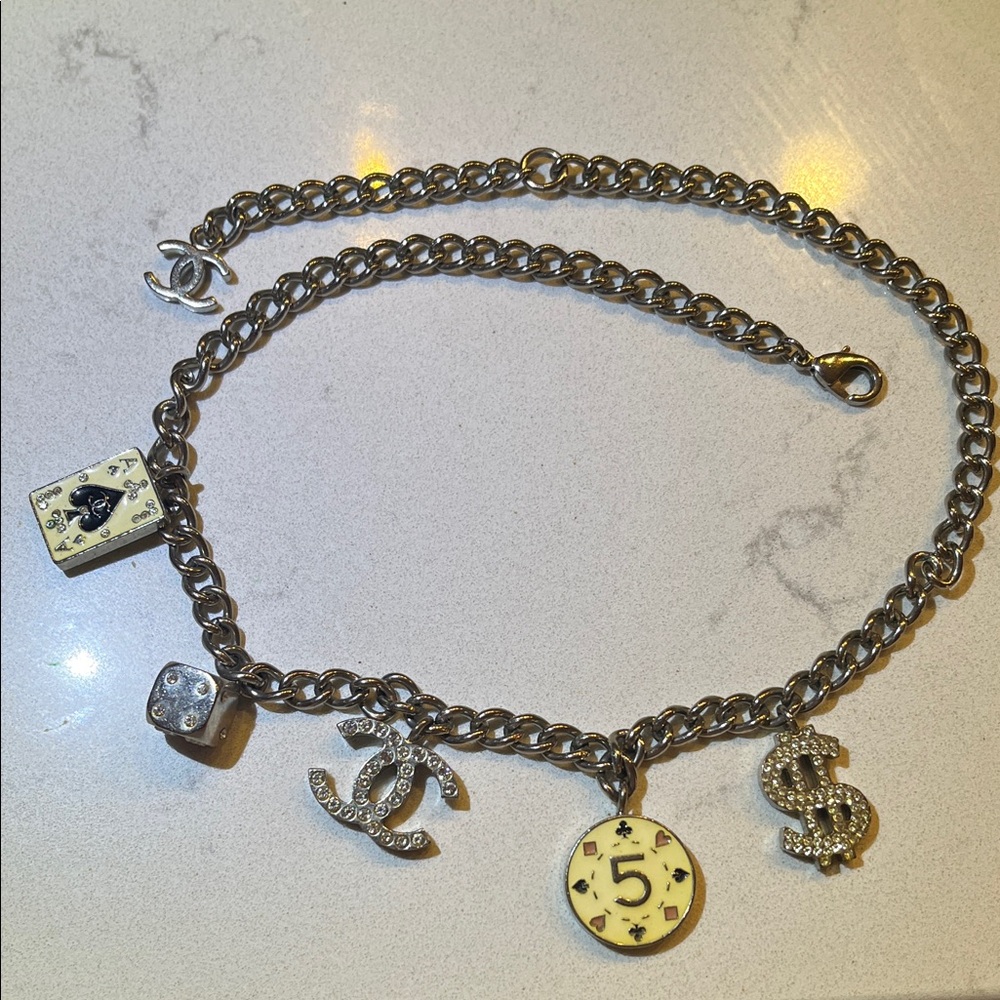 CHANEL Silver Charm Bracelet with Iconic Symbols VINTAGE